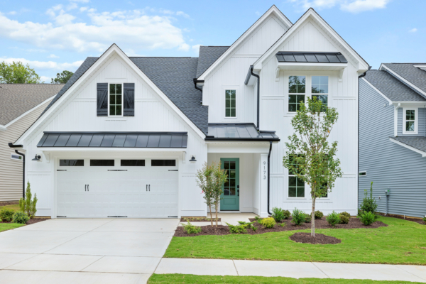 The Whitley Modern Farmhouse by Robuck Homes is a two-story home with 4 bedrooms, 3.5 bathrooms and a large bonus room. Come see it during the 2025 Triangle Parade of Homes.